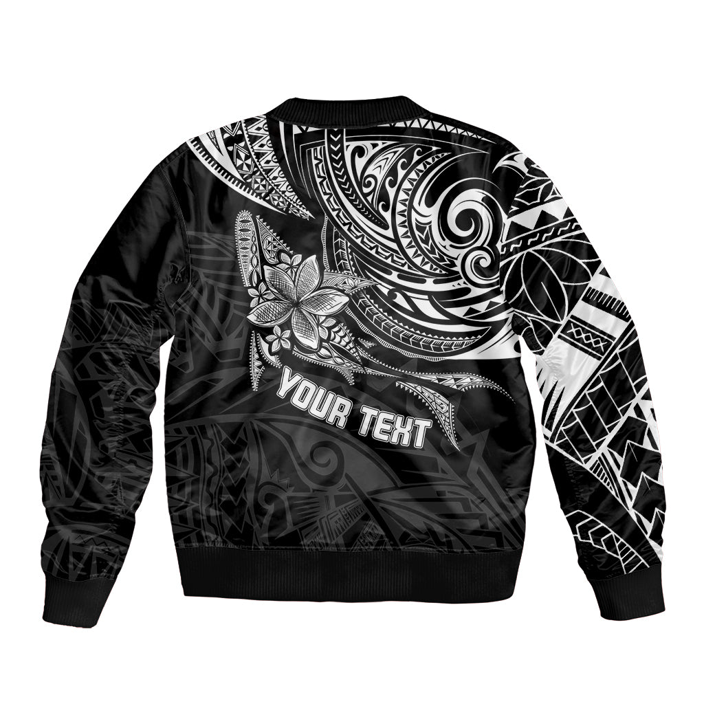 Black bomber jacket with Polynesian print, ribbed hem and cuffs, 'YOUR TEXT' on back