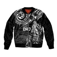 Black unisex bomber jacket with Polynesian-style tribal print, ribbed collar and cuffs