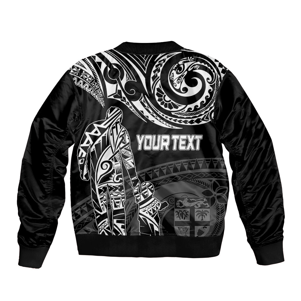 Black bomber jacket with white Polynesian-style print and 'YOURTEXT' back graphic