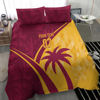 Maroon and yellow tropical bedding set with palm graphic on the duvet