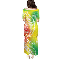 Women's long dress with green, yellow, and red tropical pattern, short sleeves