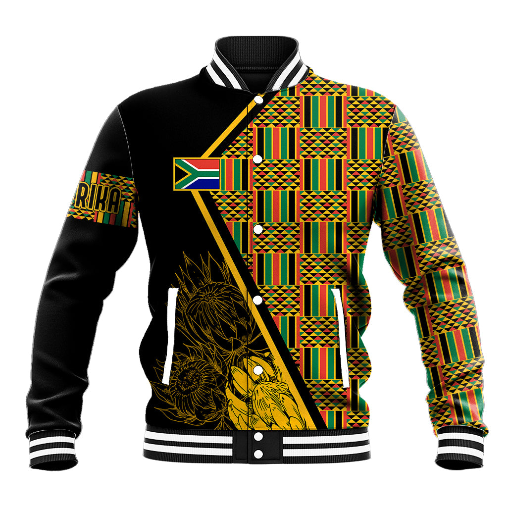 Black baseball jacket with multicolor kente-style panels and gold graphic front