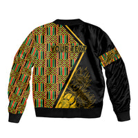 Black bomber jacket back with multicolor kente pattern panels and gold flower graphic