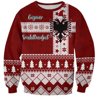 Red unisex Christmas sweatshirt with eagle graphic and festive patterned design front