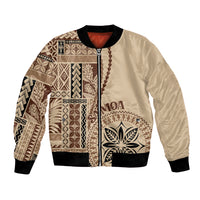 Beige bomber jacket with black ribbed collar, cuffs, and hem; patterned front