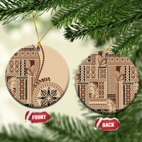Beige siapo motif ceramic ornament, round shape with brown pattern and hanging loop