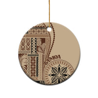 Beige siapo motif ceramic ornament, round ceramic tag with brown geometric pattern