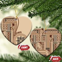 Beige siapo motif ceramic ornament, heart-shaped with brown pattern and gold hanging cord