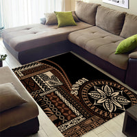 Black siapo motif area rug with round leaf emblem, tribal text, and diamond borders