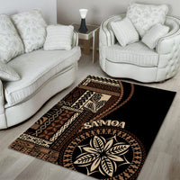 Black siapo motif rug with large leaf medallion, SAMOA lettering, and patterned stripe