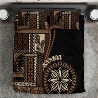 Black bedding set with brown geometric siapo motif panels and leaf medallion
