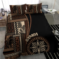 Black and brown bedding set with bold siapo geometric motifs and leaf emblem on duvet