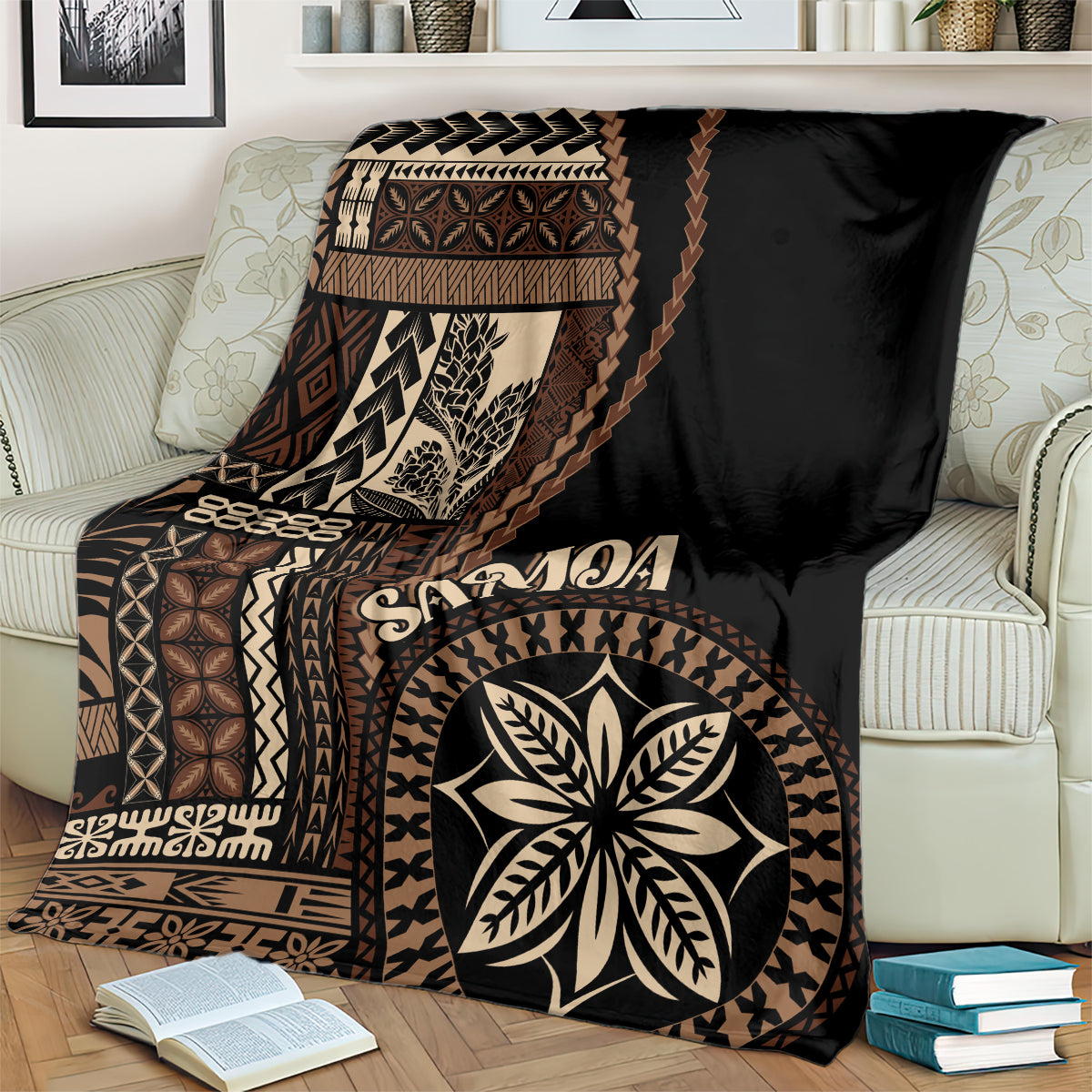 Black Samoa siapo motif blanket with ornate paneling and central leaf emblem