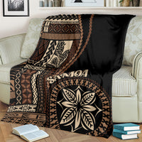 Black Samoa siapo motif blanket with ornate paneling and central leaf emblem