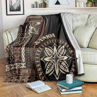 Black Samoa siapo motif blanket with geometric pattern and oversized leaf medallion