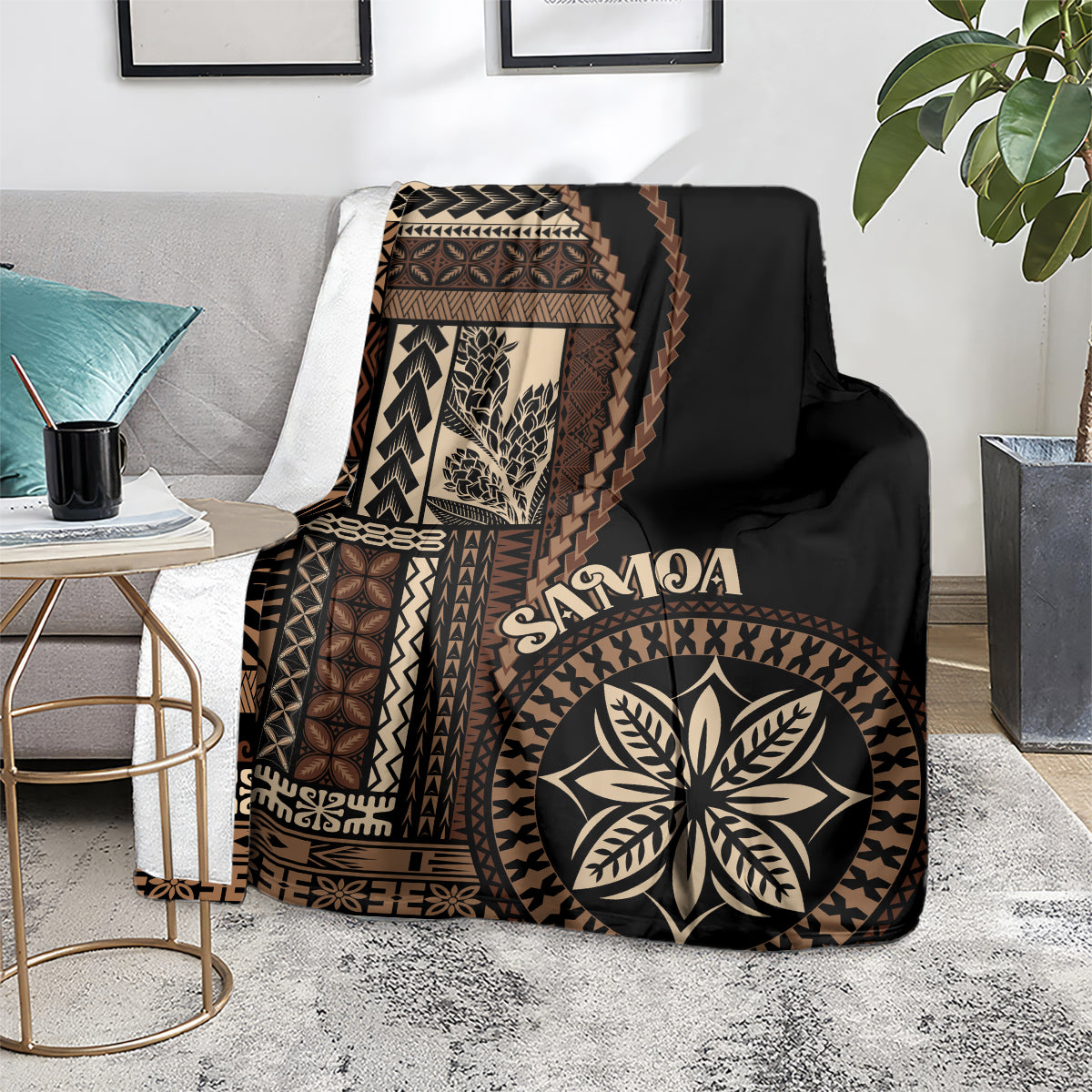 Black Samoa siapo motif blanket folded on seating with leaf emblem and patterned trim