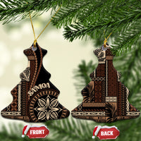Two bell-shaped ceramic ornaments with Samoa motif in black and tan, gold hanging loops