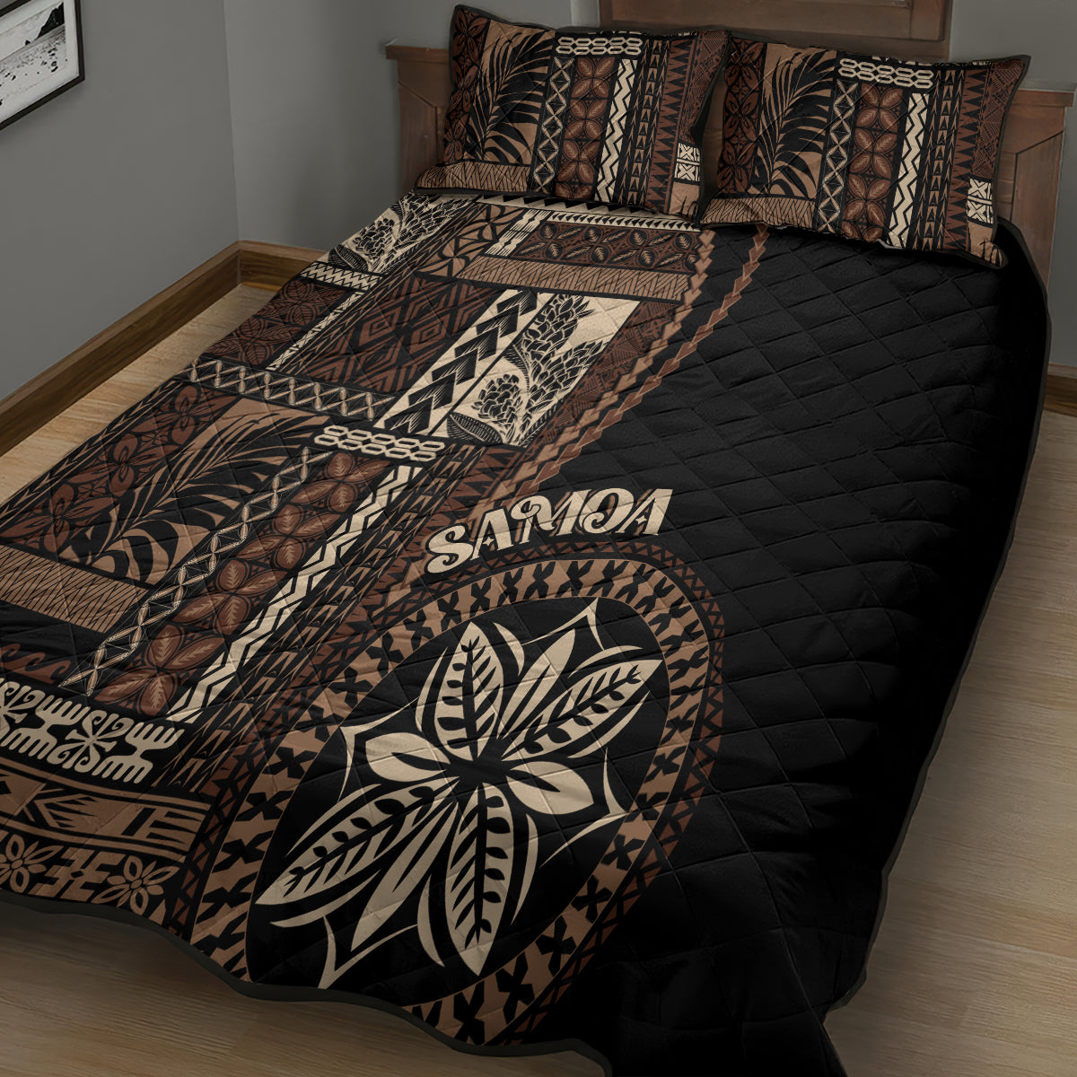 Black siapo motif quilt bed set featuring leaf emblem and geometric border across bed