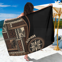 Black Samoa siapo motif sarong with large circular floral design