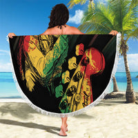 Personalised reggae beach blanket held open, round fringe trim, bold musician portrait print