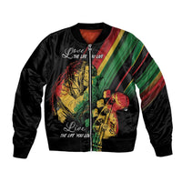 Black unisex bomber jacket with reggae musician graphic and striped sleeves, zip front