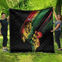 Personalized reggae quilt, black quilt with colorful reggae musician graphic and 'YOUR TEXT'.