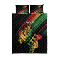 Reversible quilt bed set with black quilt, reggae musician graphic, two matching pillowcases