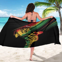 Personalized sarong on black with green/red stripes and musician portrait, 'YOUR TEXT' across center