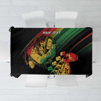 Personalised reggae tablecloth with black base and colorful character graphic, green and red stripes