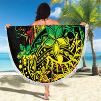 Round beach blanket with white fringe, black reggae graphic with green and yellow line art