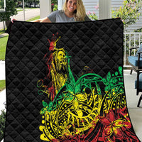 Black quilt with diamond quilting and colorful reggae dancer graphic in green, yellow, red.