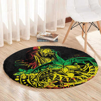 Round area rug, black with neon green/yellow/red Polynesian style graphic, large round