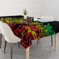 Black reggae tablecloth with bold red, yellow, and green Polynesian patterns