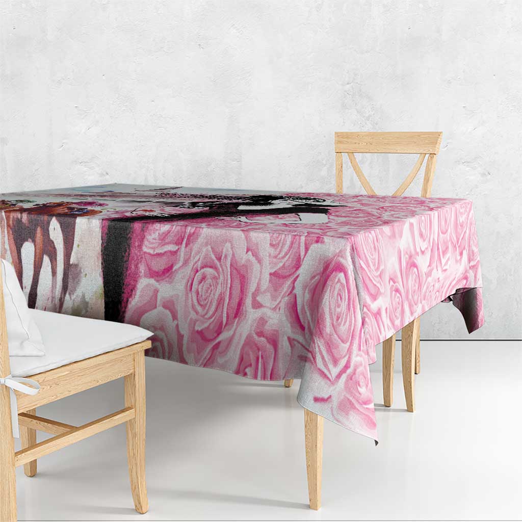 Pink rose-pattern tablecloth, single corner draped over table edge