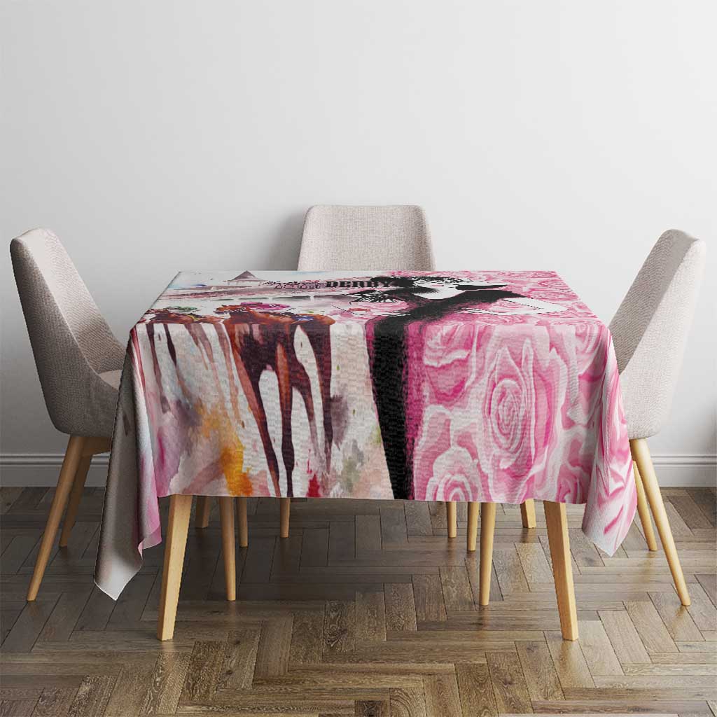 Pink rose-pattern tablecloth on square table with four chairs