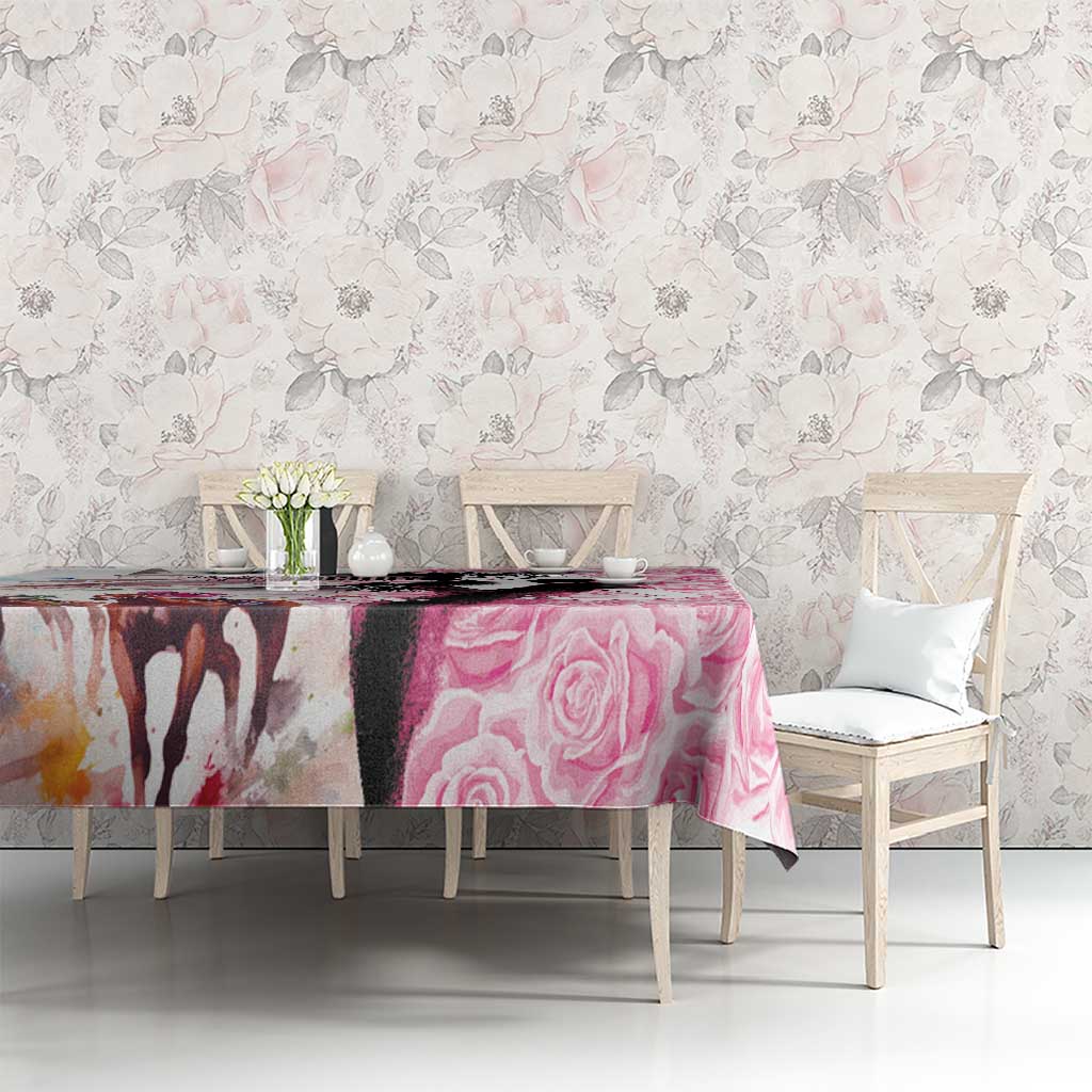 Pink rose-pattern tablecloth on dining table with matching chairs