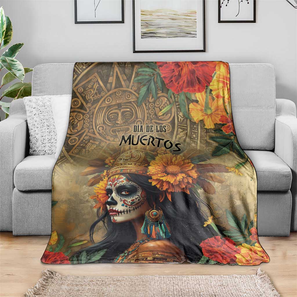Dia de los Muertos blanket draped over sofa, goddess portrait with orange and yellow flowers