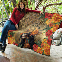 Dia de los Muertos quilt held outdoors, showing skeleton goddess face and vivid flower print