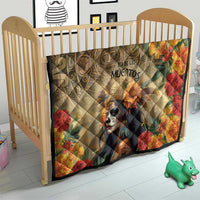 Dia de los Muertos quilt laid on a toddler bed, featuring skeleton goddess and bright blooms
