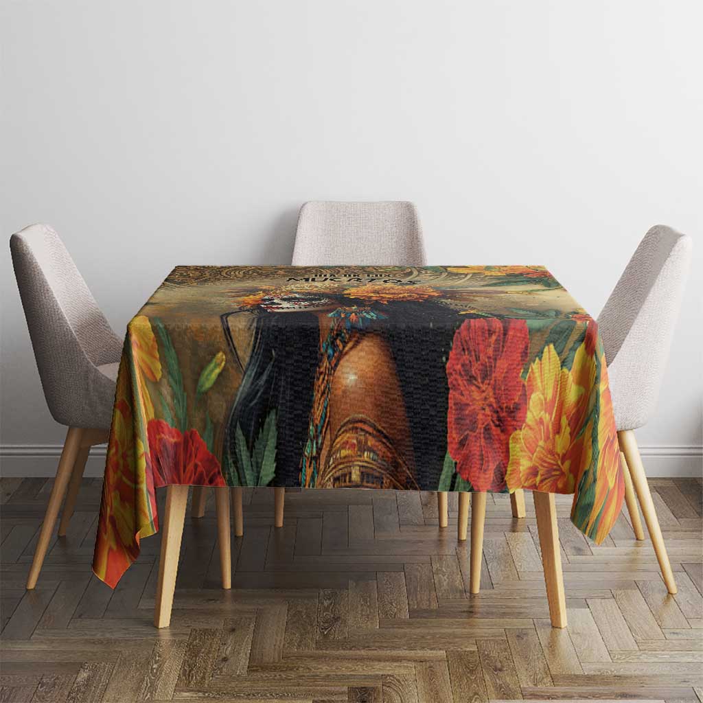 Rectangular tablecloth with dark portrait artwork and bold red flowers with botanical accents