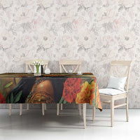 Rectangular tablecloth with red and yellow blossoms and a dark portrait panel