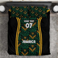 Black bedding set with teal and gold ethnic pattern, 'Jamaica' and '07' text