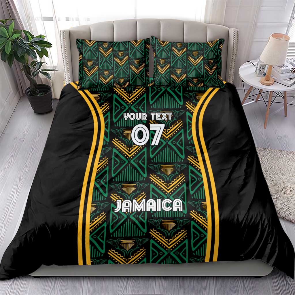 Black duvet and pillow set with teal geometric motifs, 'Jamaica' and '07' center
