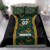 Black duvet and pillow set with teal geometric motifs, 'Jamaica' and '07' center