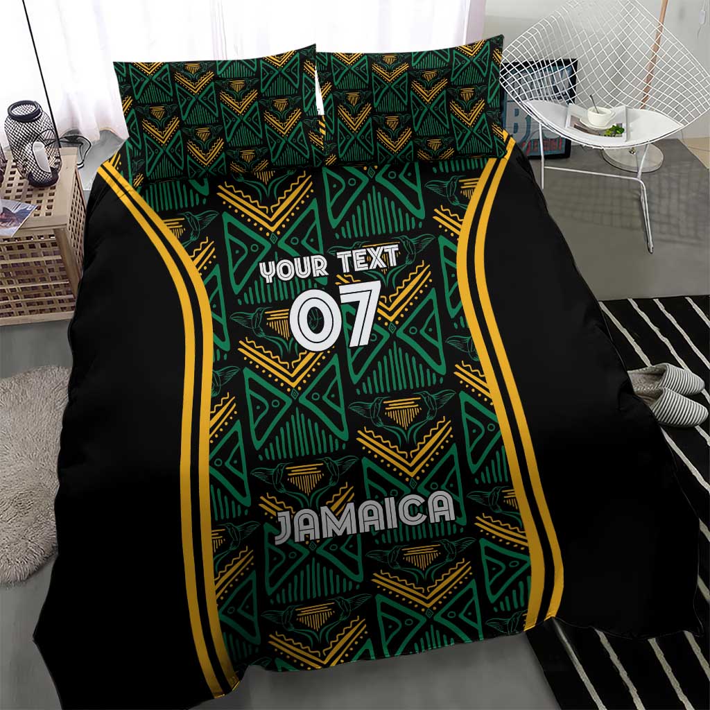 Black bedding cover with teal tribal pattern and yellow stripes; 'Jamaica' and '07'