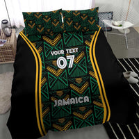 Black bedding cover with teal tribal pattern and yellow stripes; 'Jamaica' and '07'