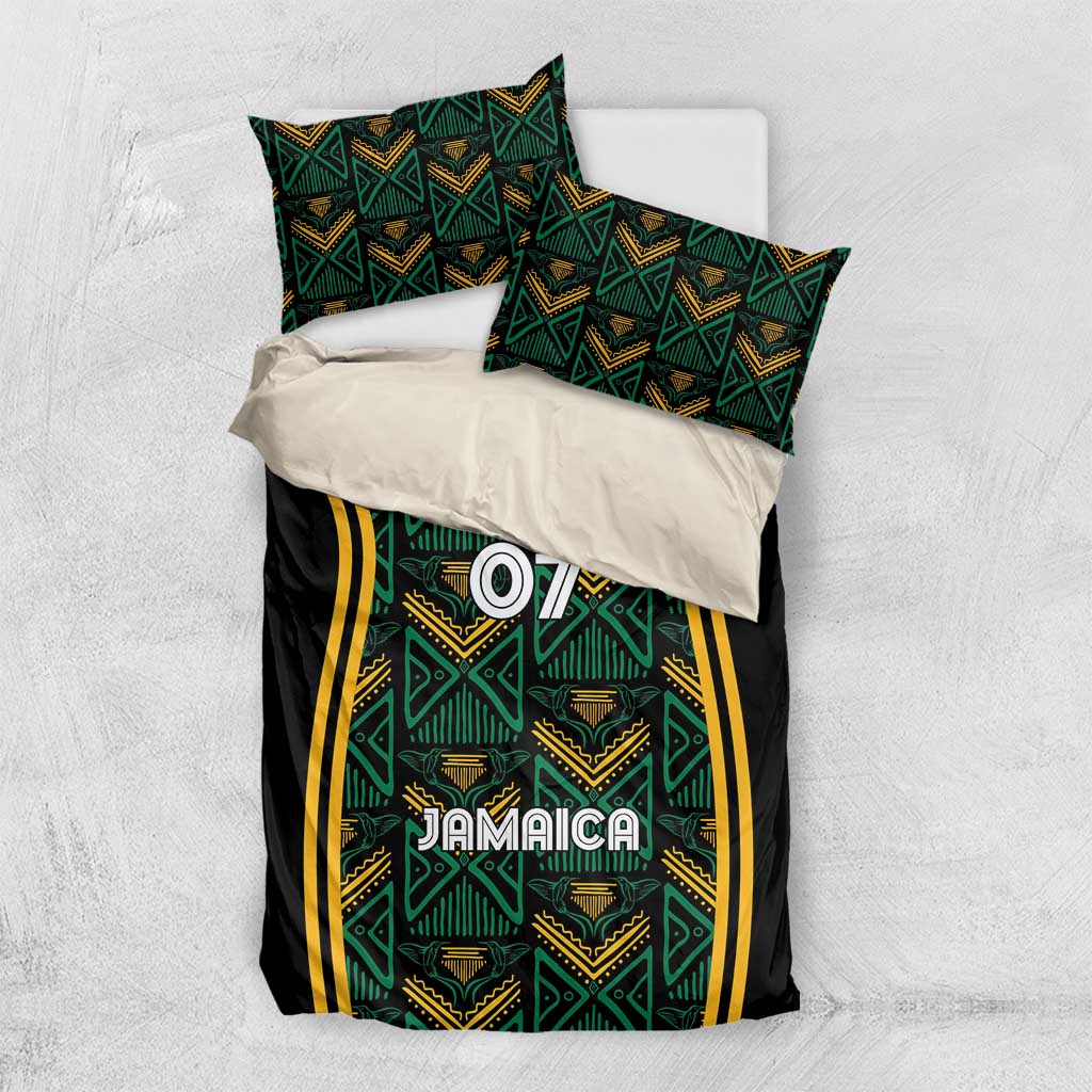 Black duvet and pillowcases with teal pattern, yellow stripes, 'Jamaica' and '07'