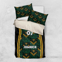 Black duvet and pillowcases with teal pattern, yellow stripes, 'Jamaica' and '07'