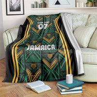 Custom Jamaica reggae blanket with teal and gold tribal pattern, black edges