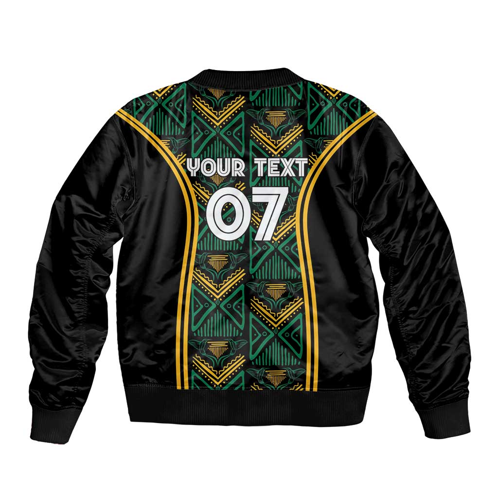 Black bomber jacket with green and gold ethnic motif, back print YOUR TEXT 07, ribbed hem
